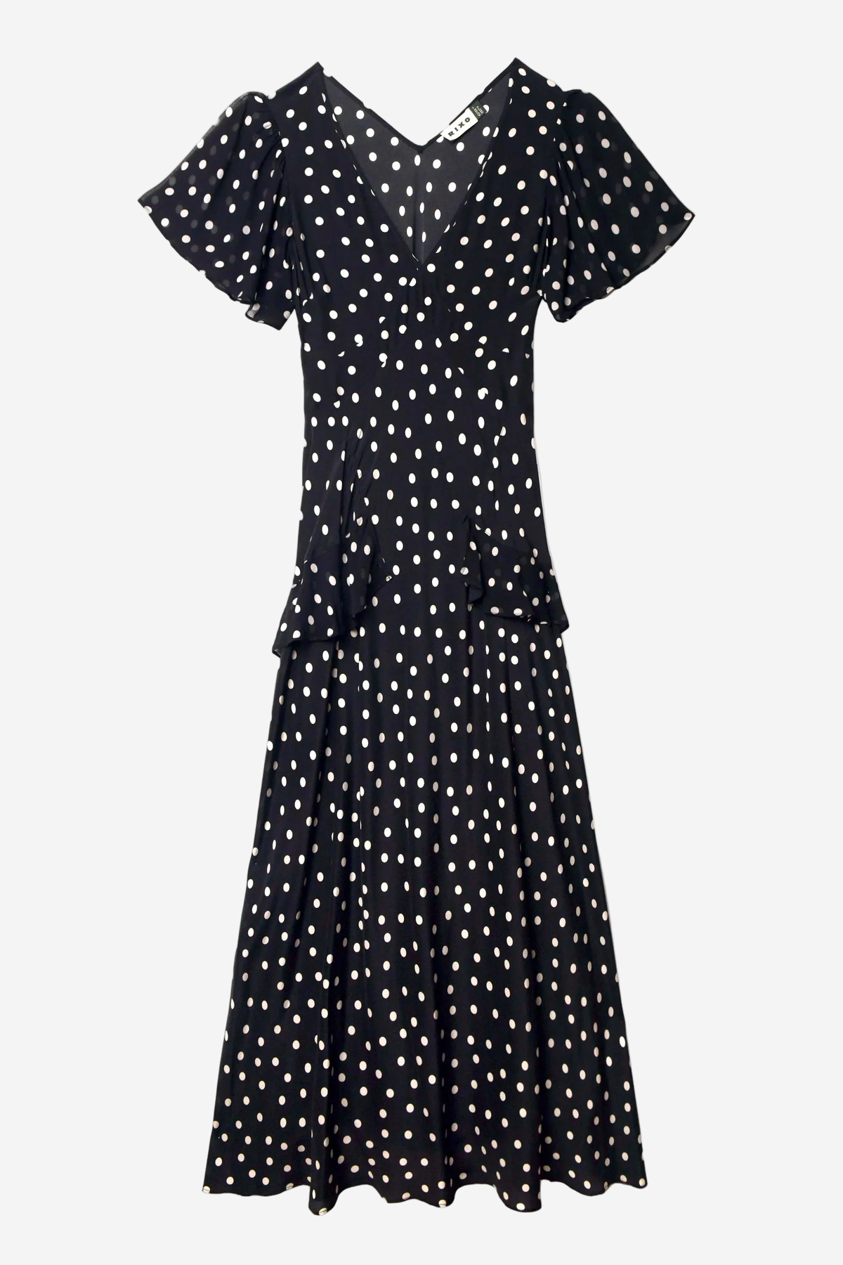 Black dress with white polka dots on a white background