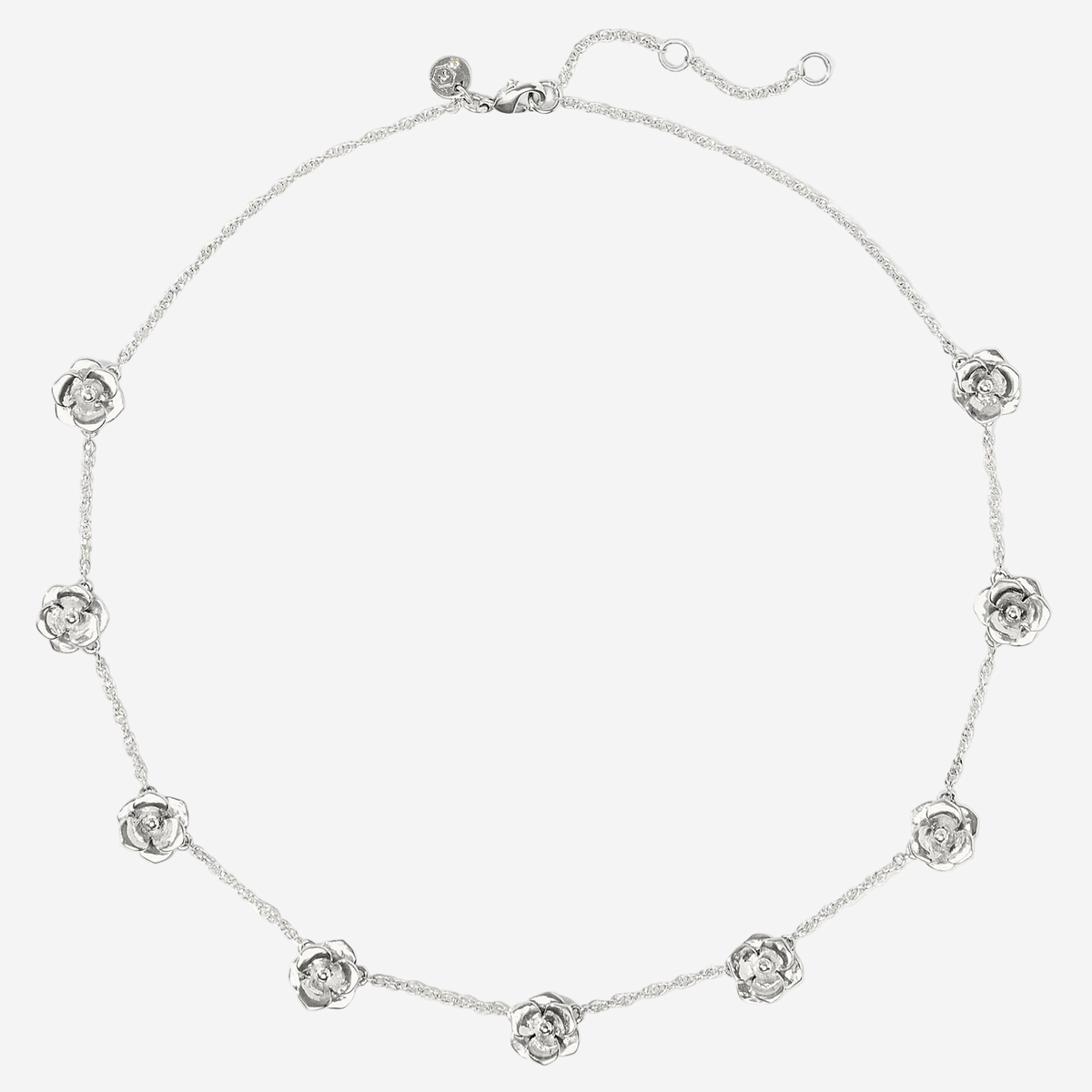 Silver necklace with floral designs on a white background