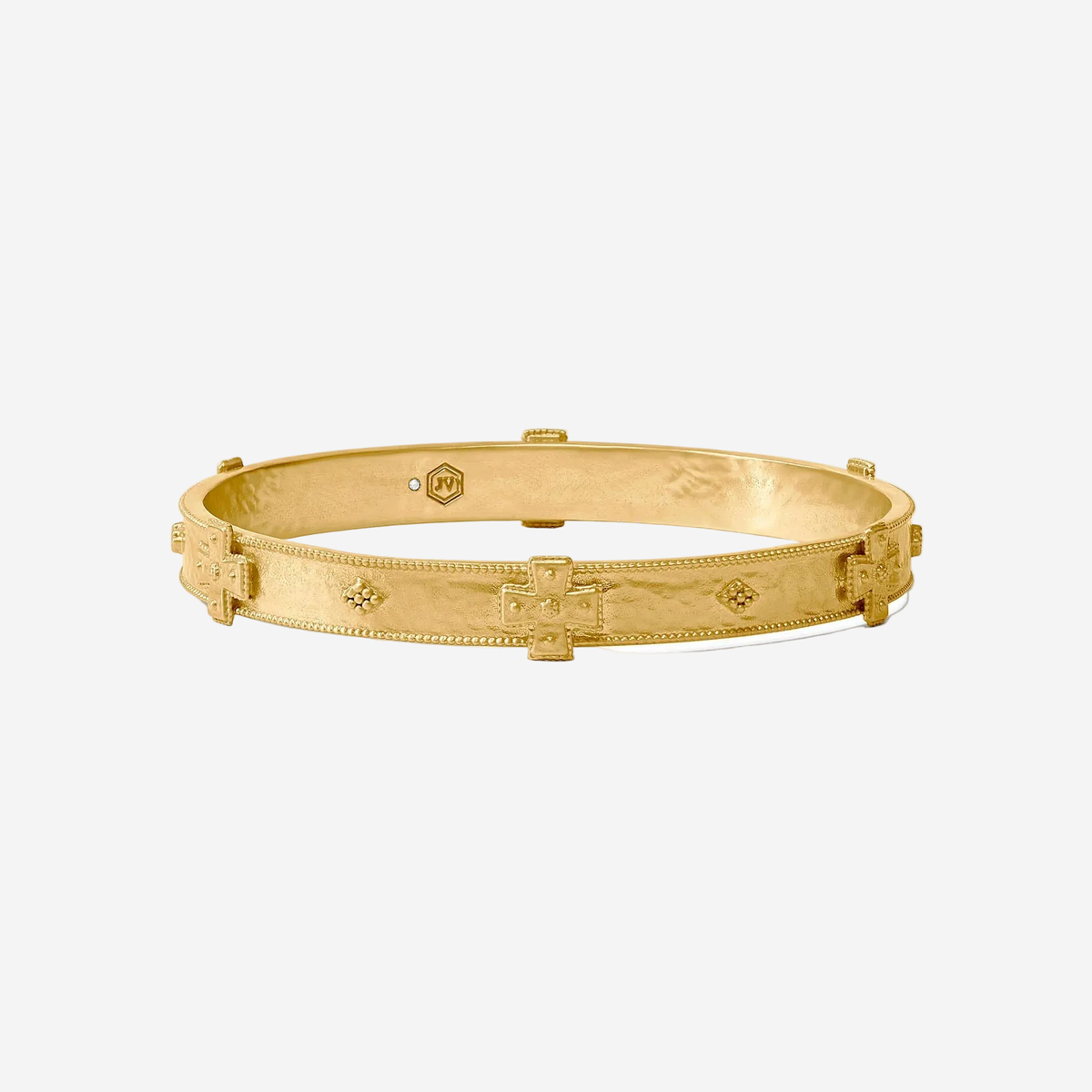 Gold bracelet with intricate design on a white background