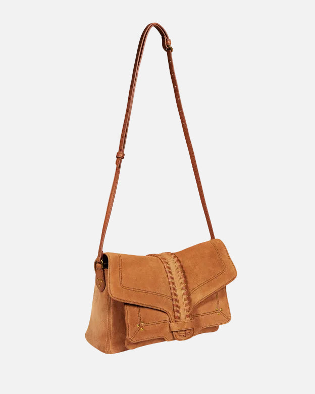 Brown leather handbag with a strap on a white background