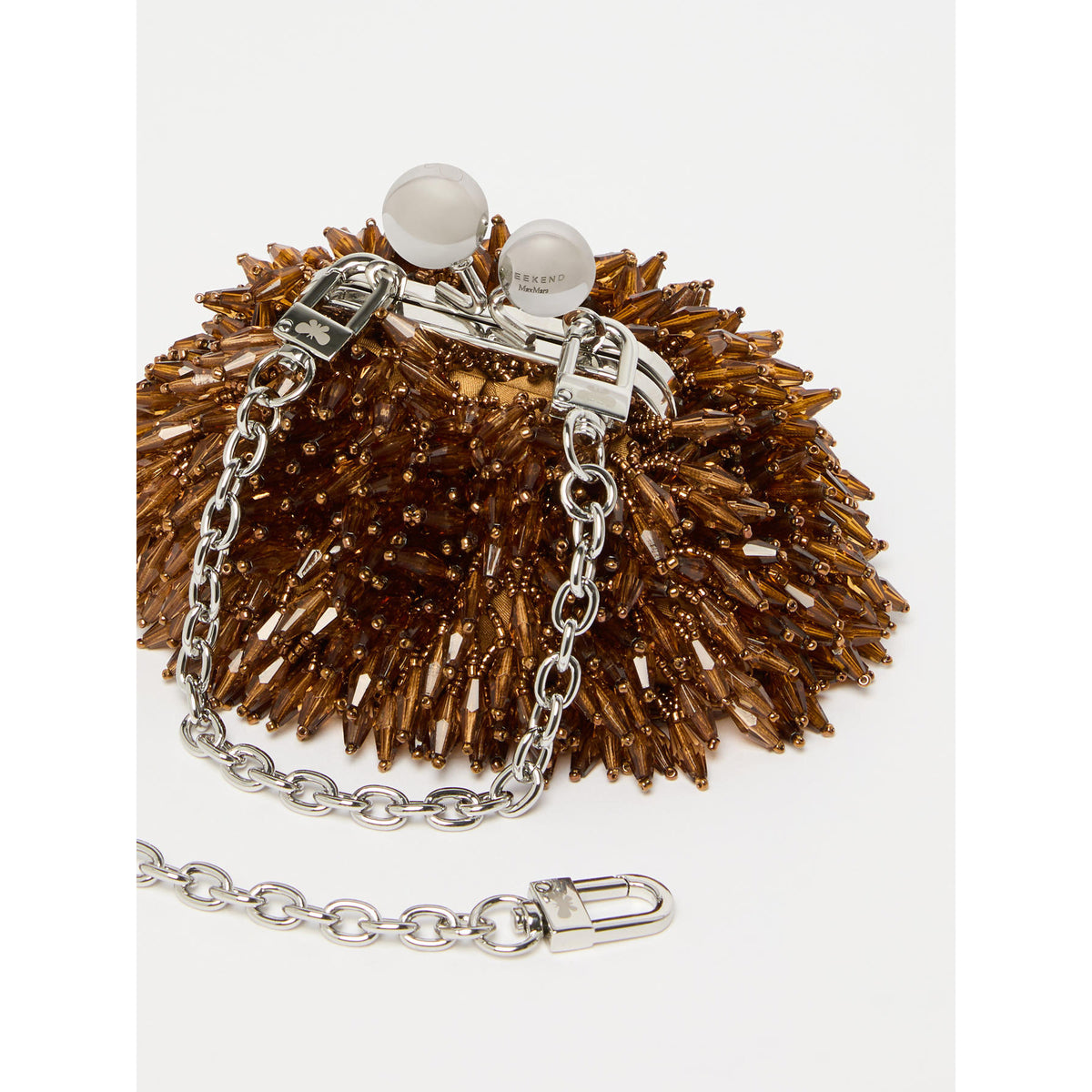 Brown textured handbag with silver chain and clasp on a white background