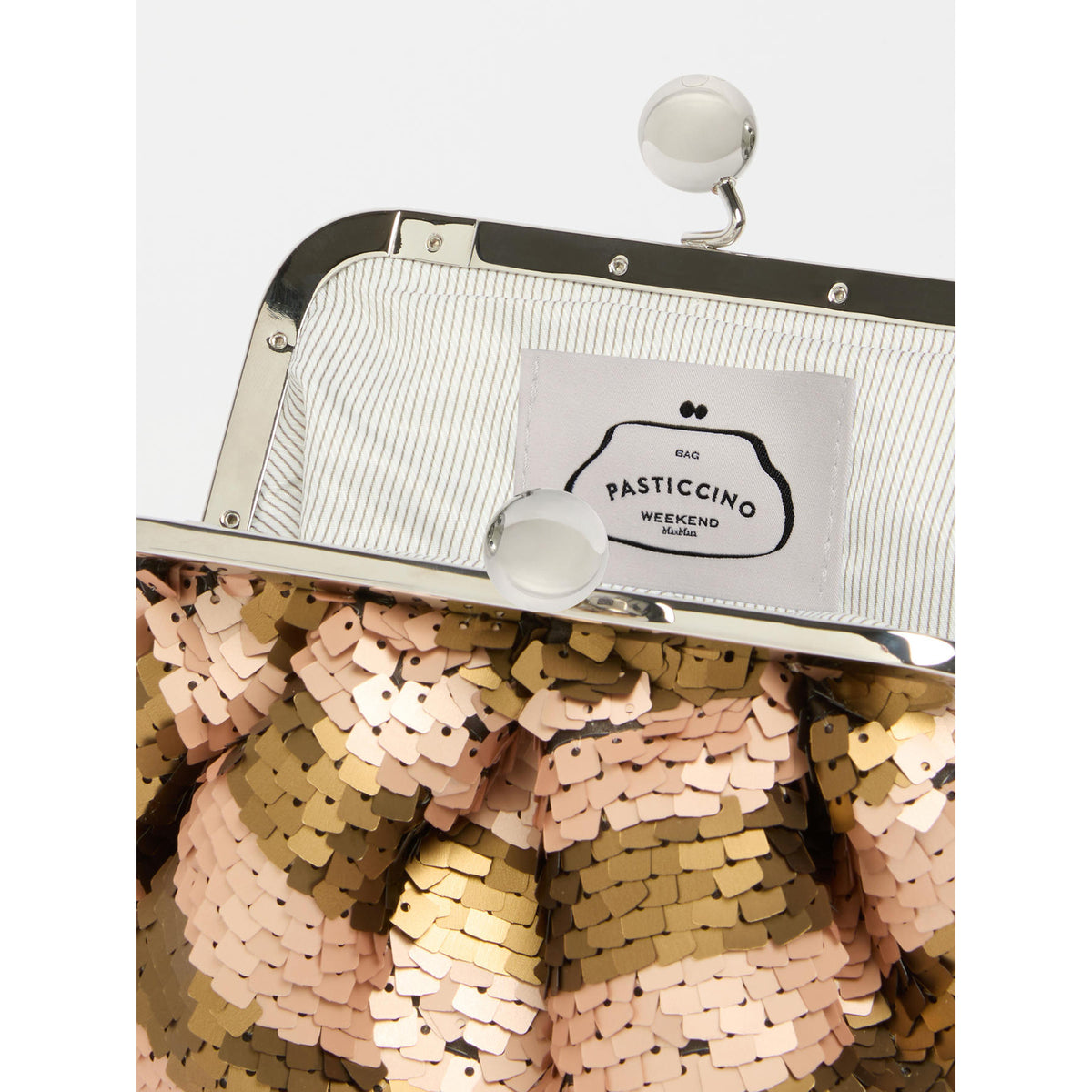 Sequined clutch bag with a visible brand label on a white background