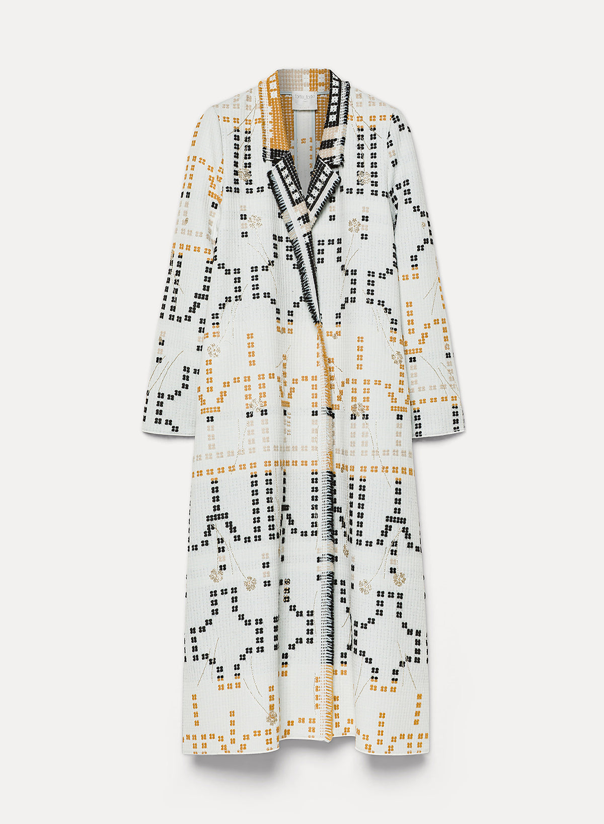 white coat with black and orange geometric pattern