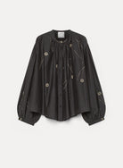 BLACK SHIRT WITH EMBROIDERED FLOWERS