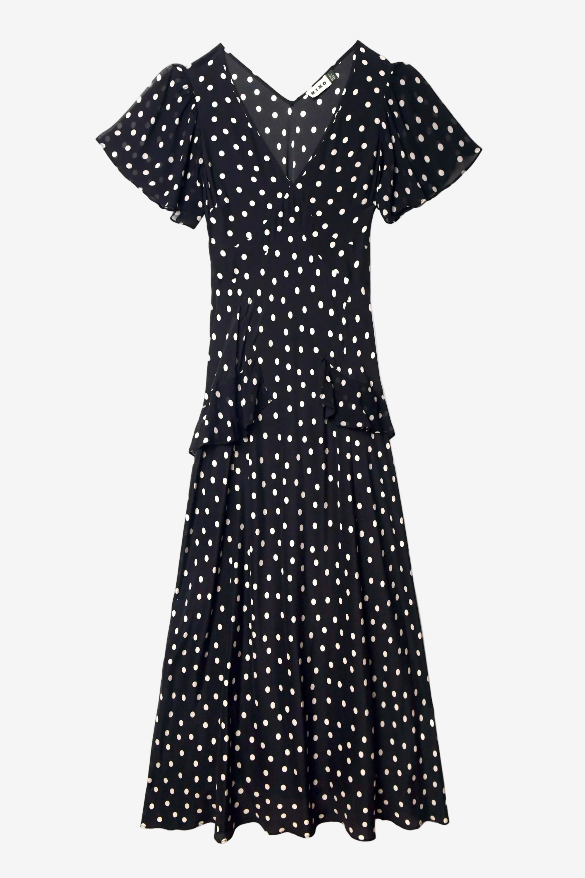 Black dress with white polka dots on a white background