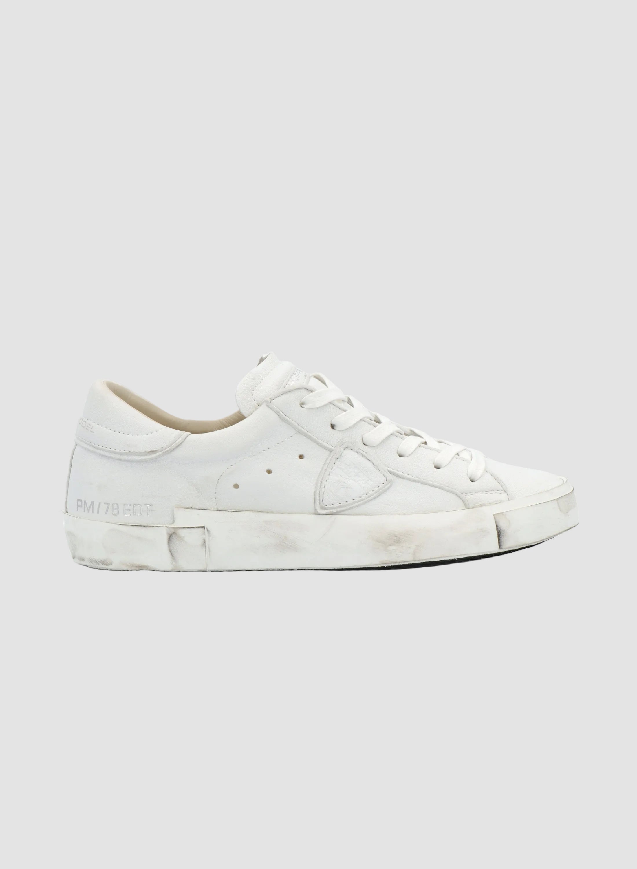 White sneakers on a white background