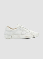 White sneakers on a white background