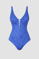 Blue leaf-patterned swimsuit on a white background