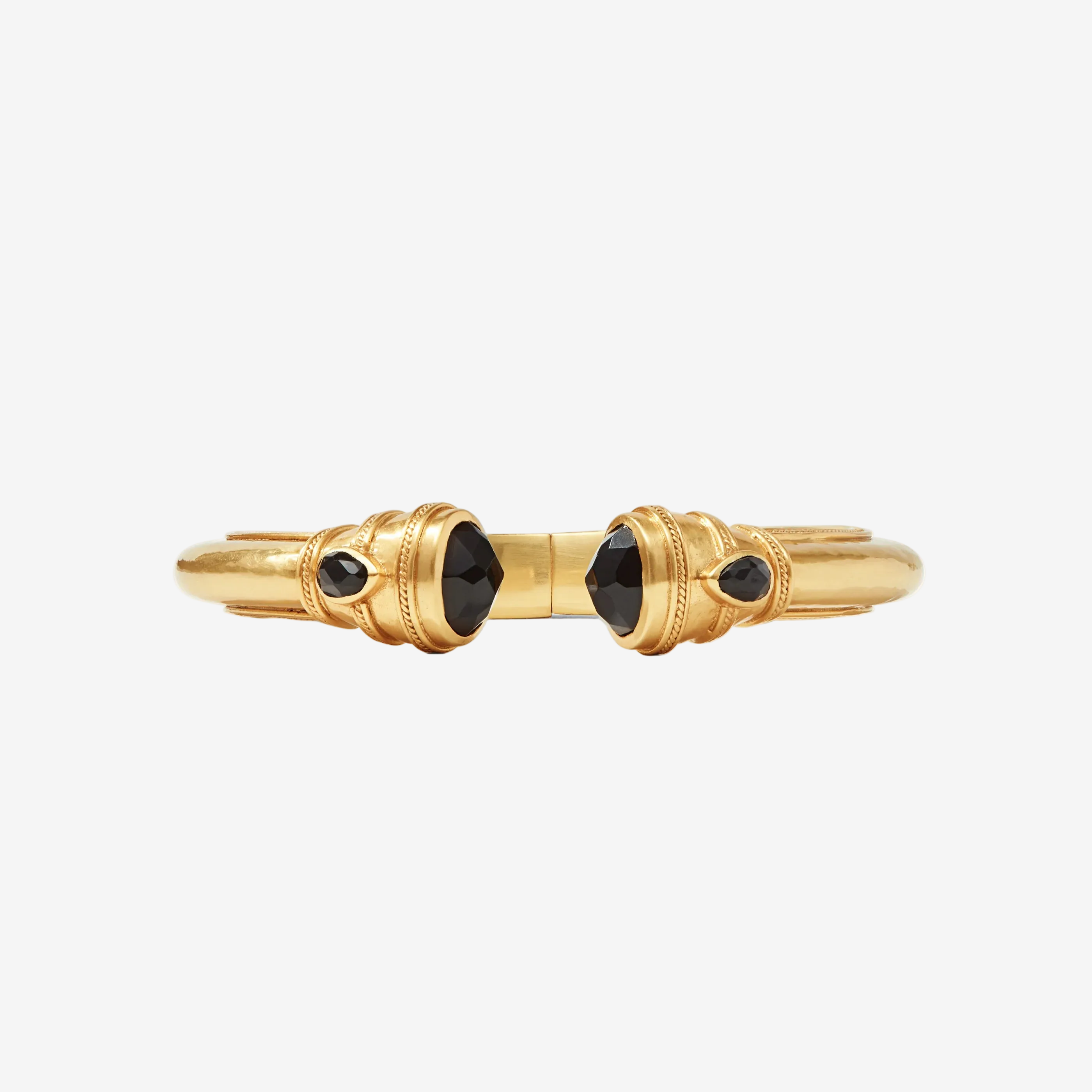 Gold bracelet with black gemstones on a white background
