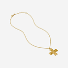 Gold necklace with a cross pendant on a white background