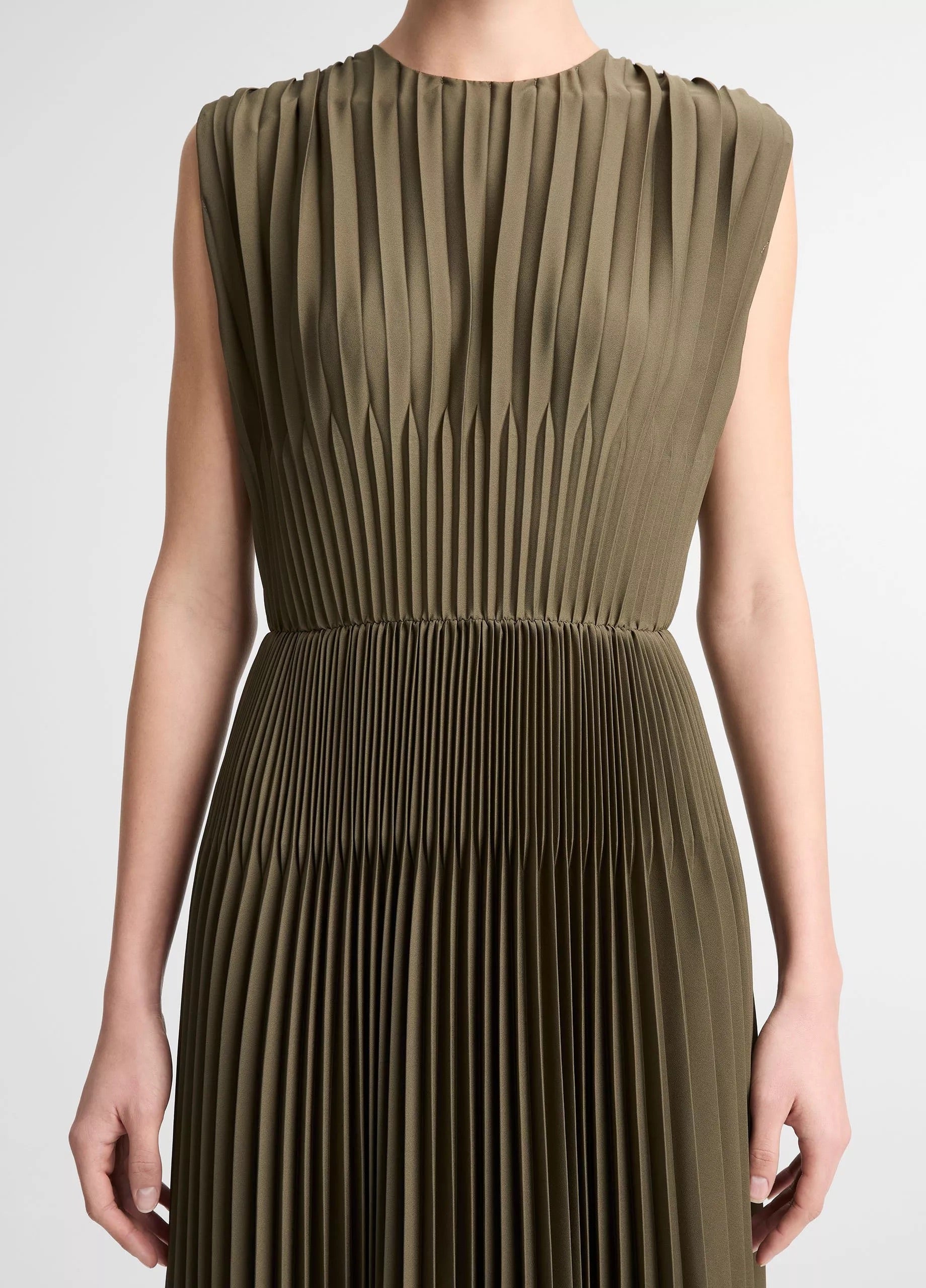 green pleated dress