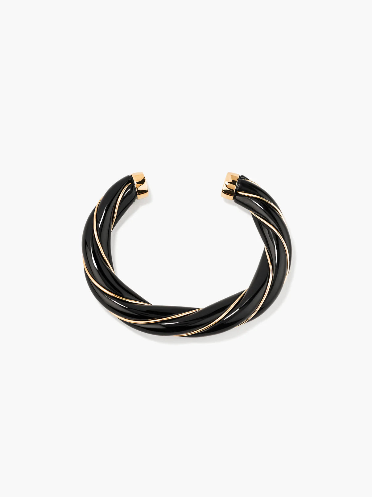 Black and gold bracelet on a white background