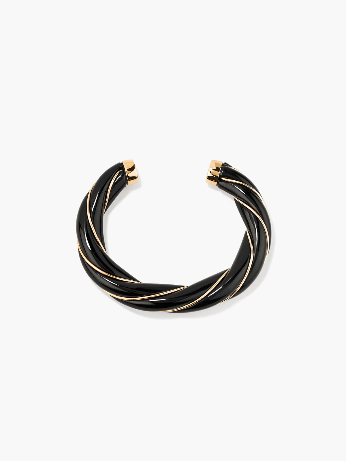 Black and gold bracelet on a white background