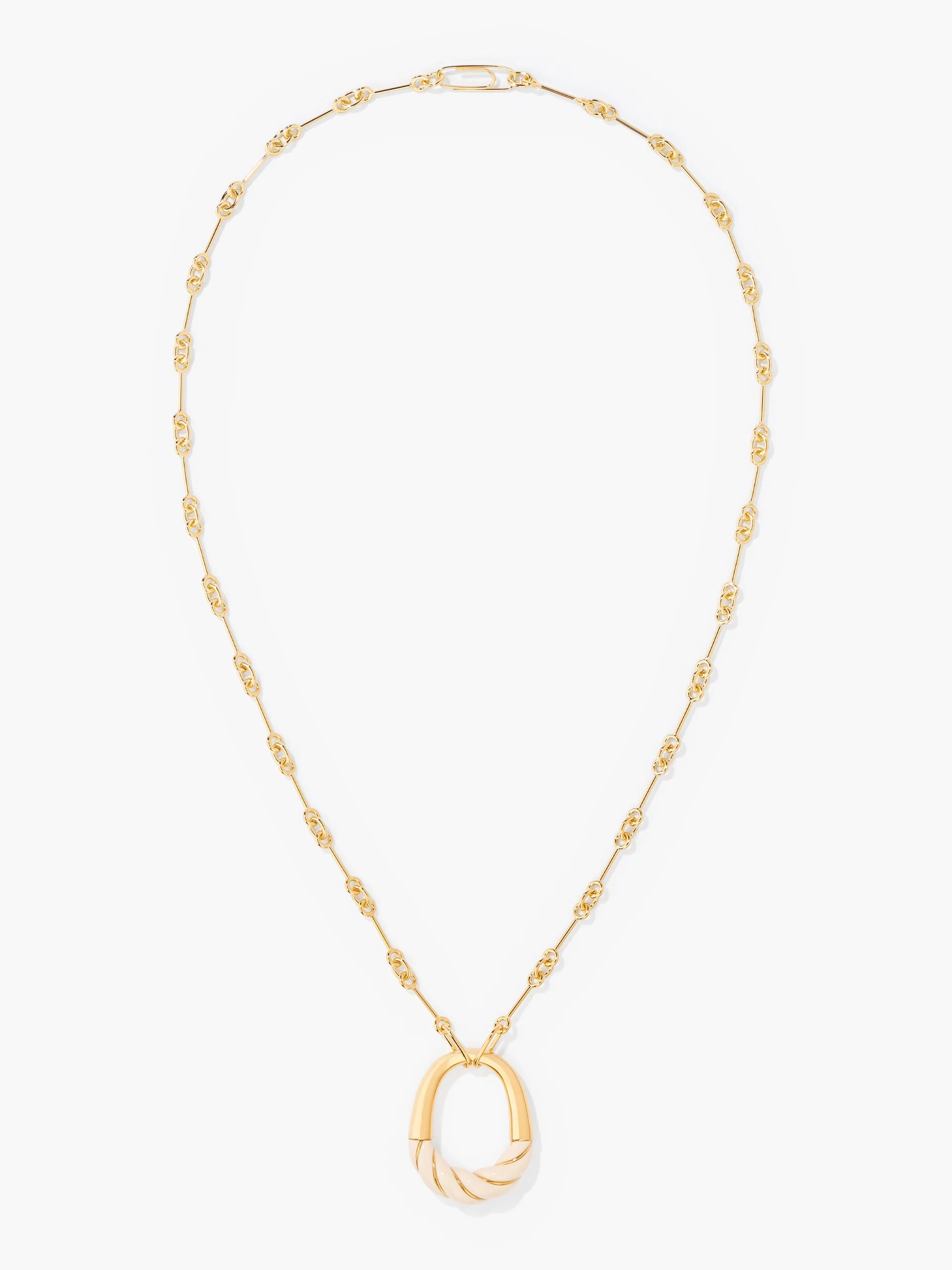 Gold necklace with a unique pendant on a white background