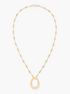 Gold necklace with a unique pendant on a white background