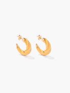 yellow and gold twisted hoops