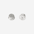 Two silver earrings on a white background