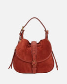 Brown suede handbag with gold accents on a white background