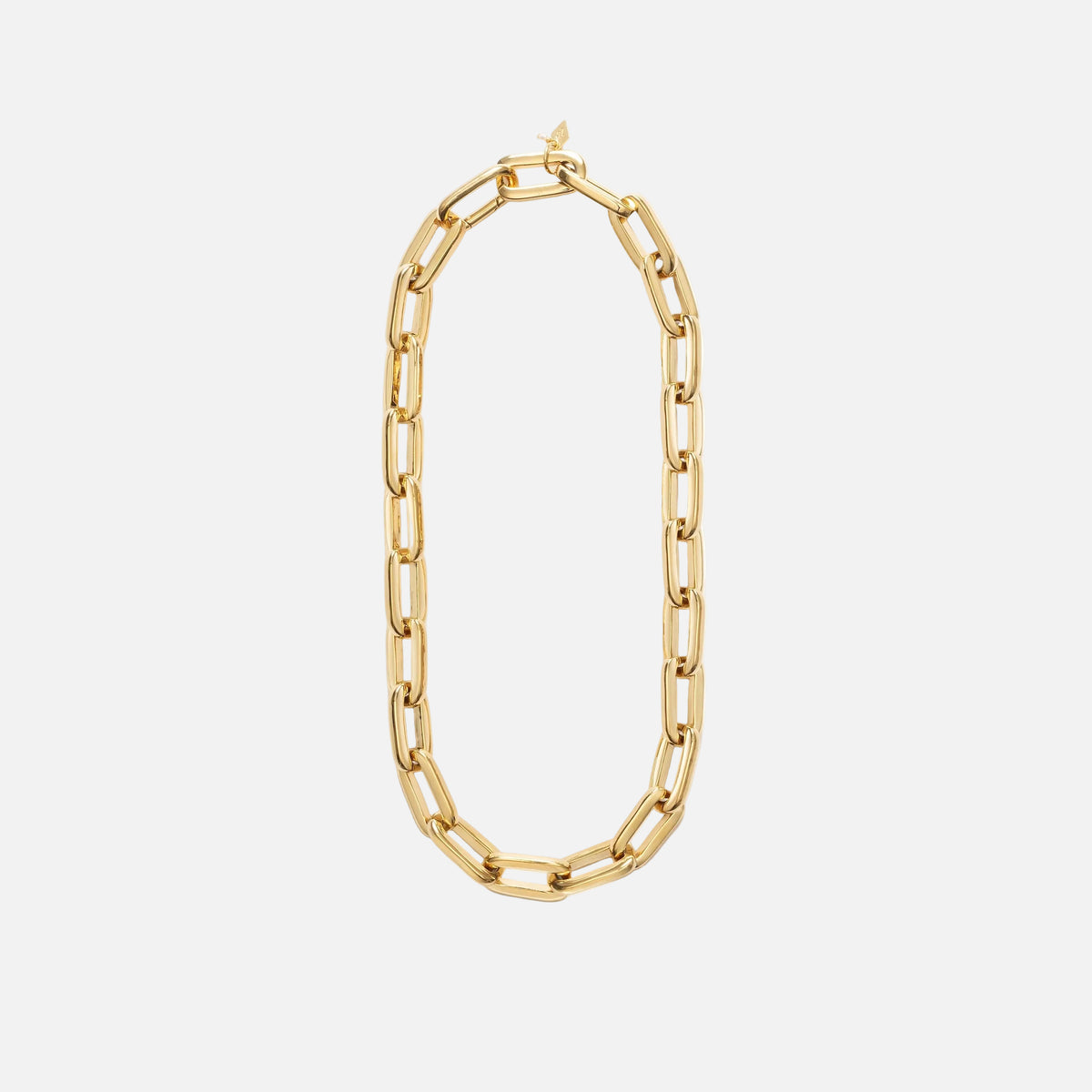 Gold chain necklace on a white background