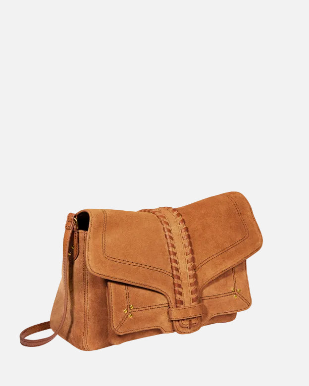 Brown leather bag on a white background