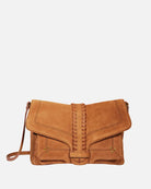 Brown suede handbag on a white background