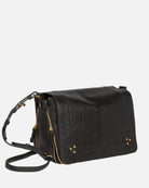 Black leather handbag with gold accents on a white background