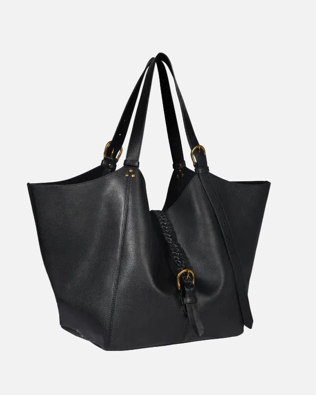 Black leather tote bag with gold accents on a white background