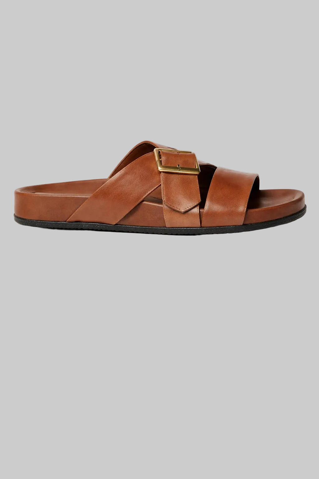 Brown leather sandal with multiple straps on a white background