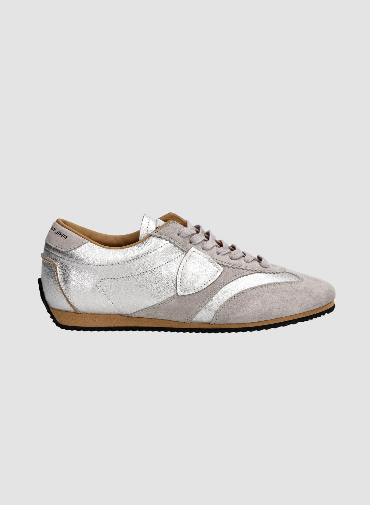 White and brown sneaker on a white background