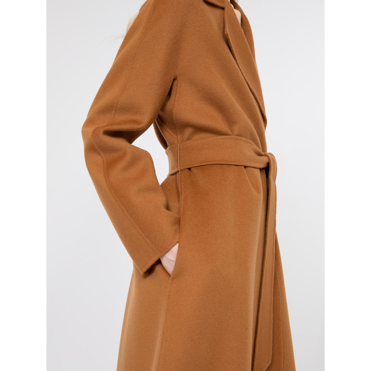 Brown coat with a belt on a white background