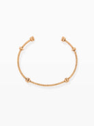 Gold necklace on a white background