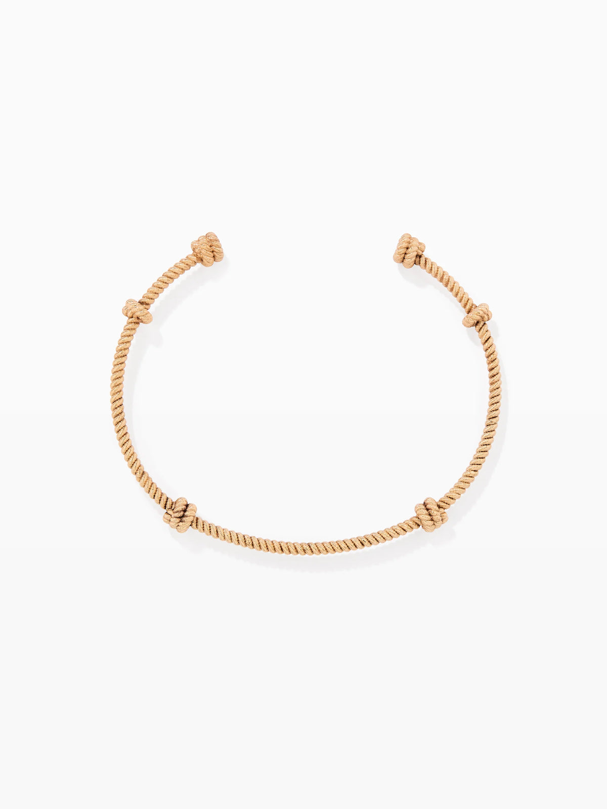 Gold necklace on a white background