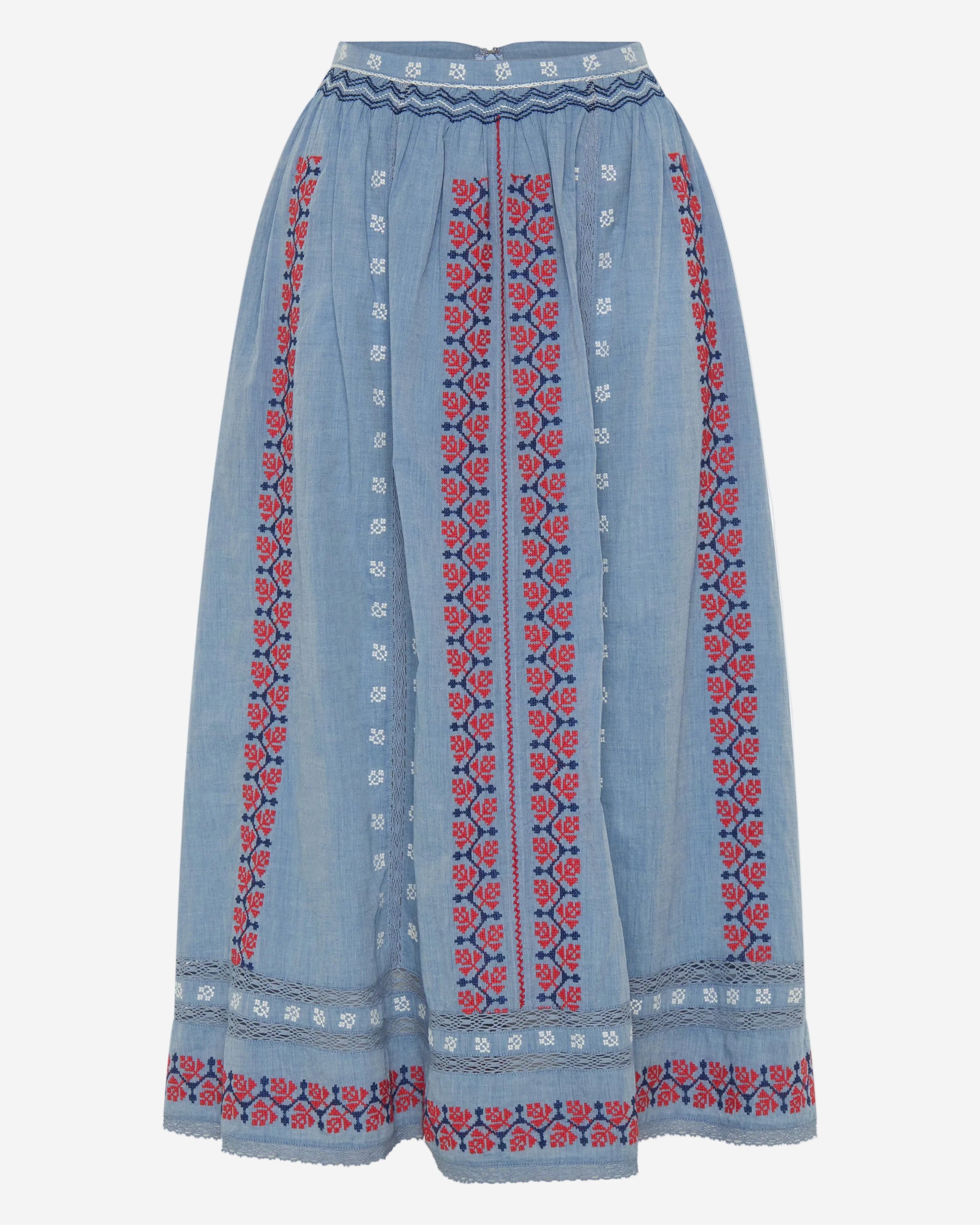 Blue skirt with red and white floral embroidery on a white background