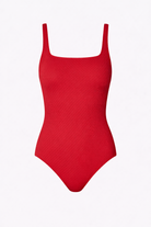 Red swimsuit with thin straps on a white background