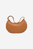 Brown woven handbag on a white background