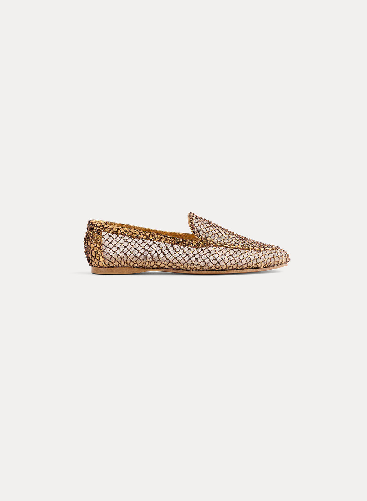 Gold woven flat shoe on a white background