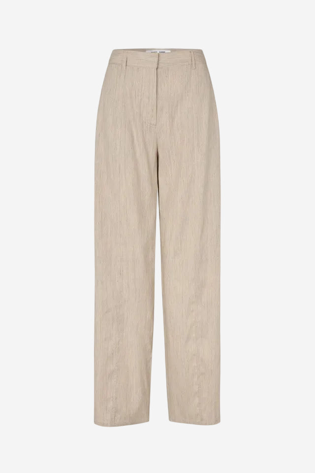 Beige pants on a white background