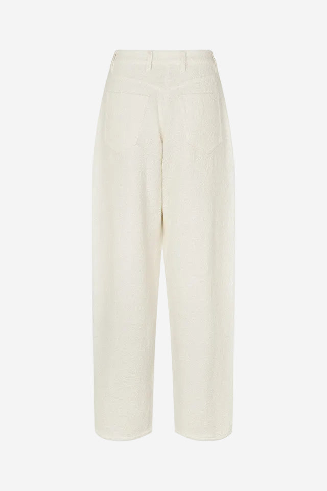 White wide-leg pants on a white background