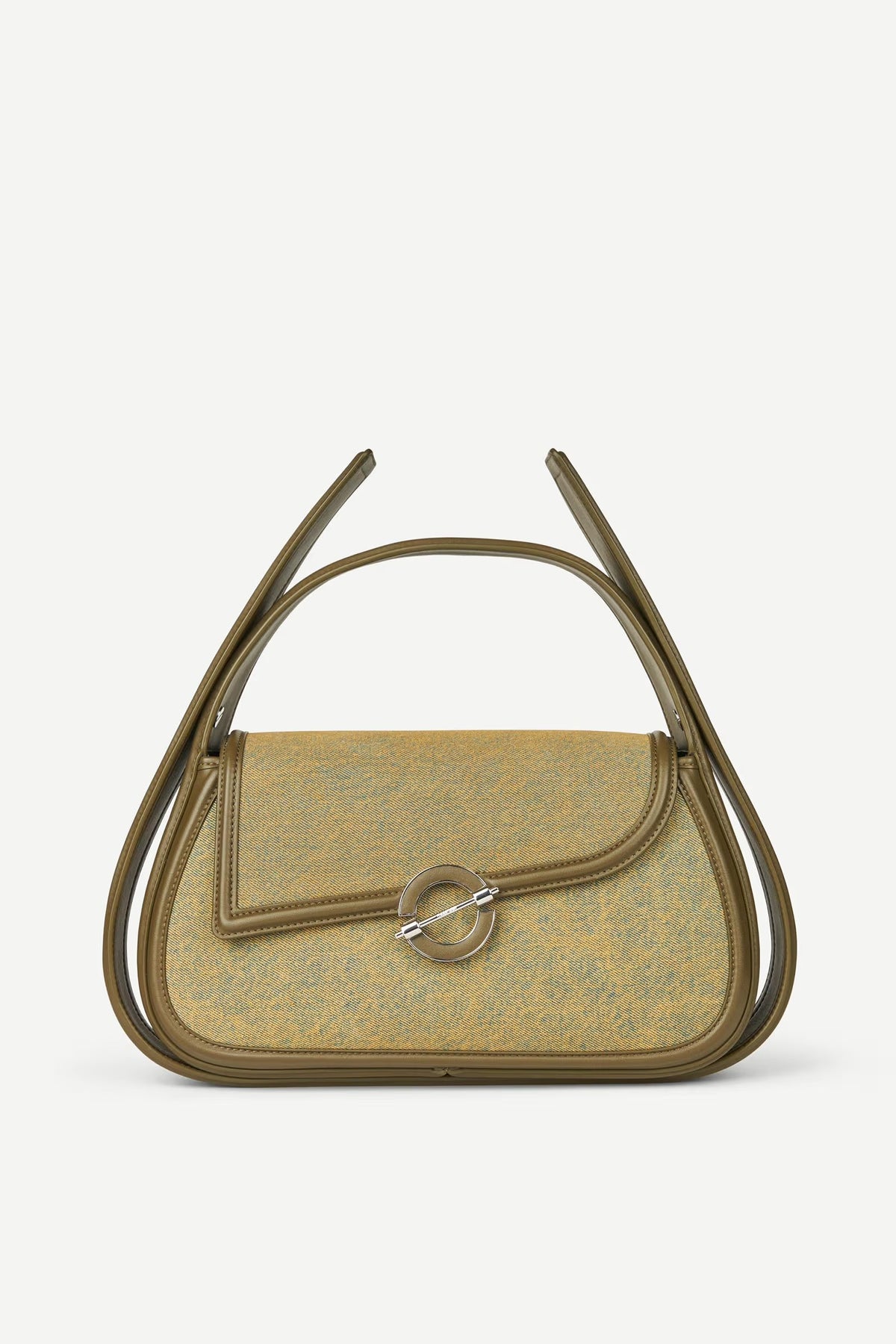 Handbag with a decorative handle on a light gray background