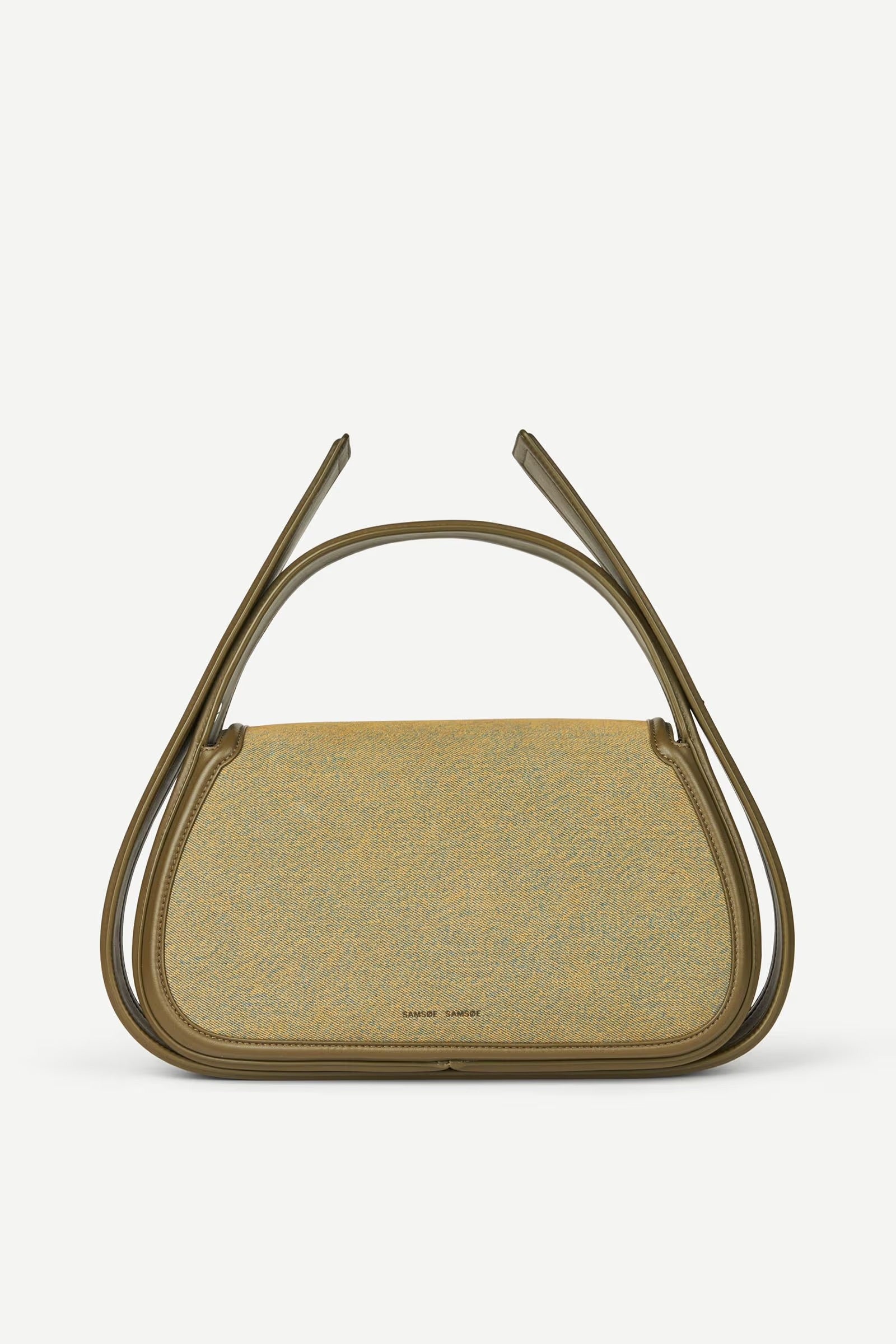 Green handbag with unique handle design on a white background
