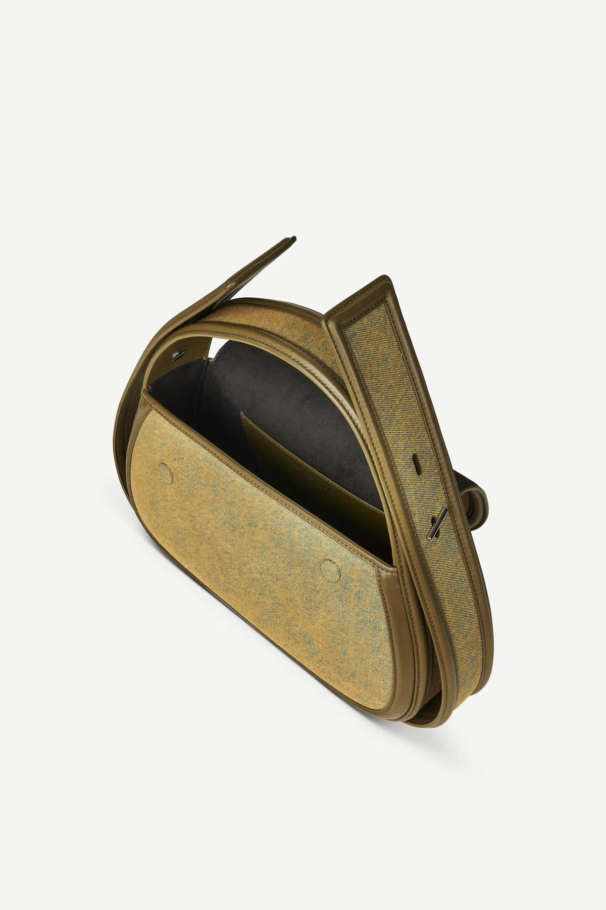 Bronze-colored metal object on a white background