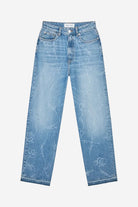 Light blue jeans with subtle patterns on a white background