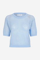 Light blue sweater on a white background