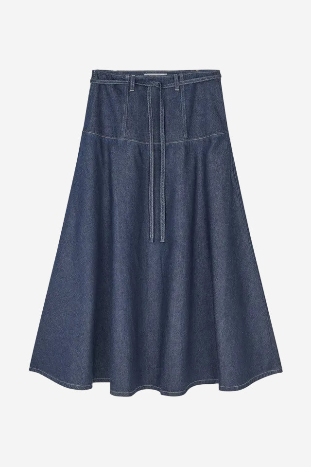 Blue denim skirt on a white background