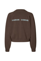 Brown jacket with 'SAMSØE' branding on the back against a white background