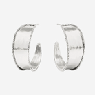 Pair of silver hoop earrings on a white background