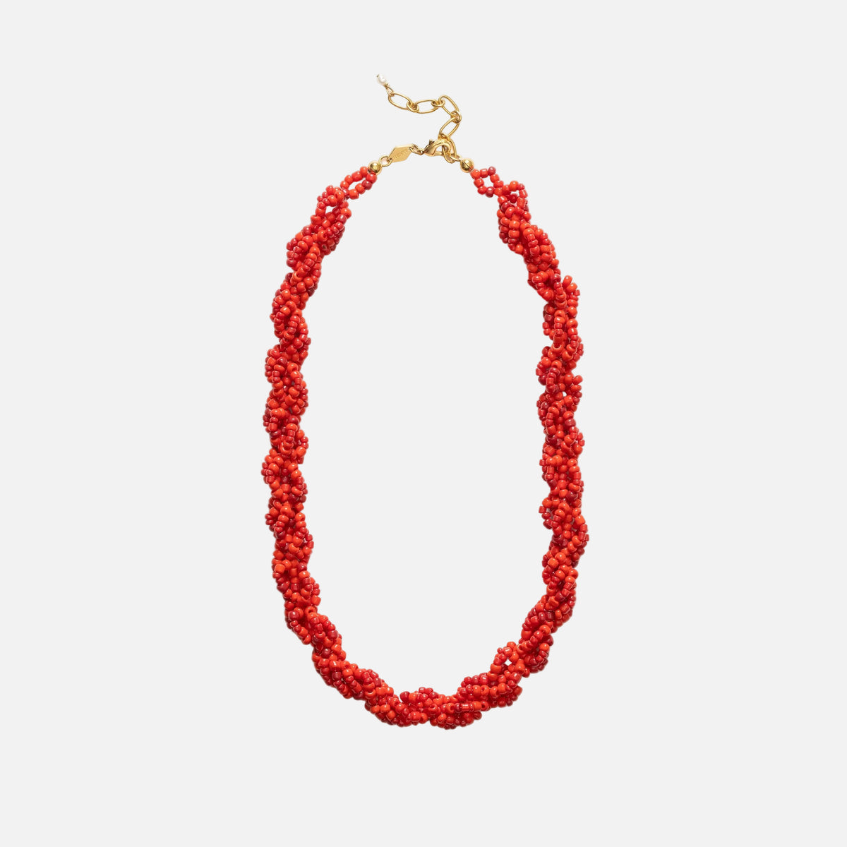 Red beaded necklace with a gold clasp on a white background