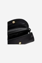 Black handbag with gold buttons on a white background