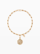 gold necklace with  abstract heart heart pendant