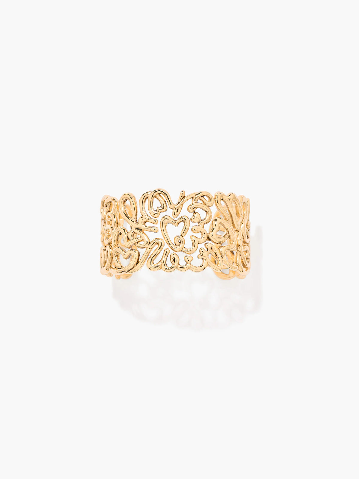 Gold BRACELET CUFF with intricate design on a white background